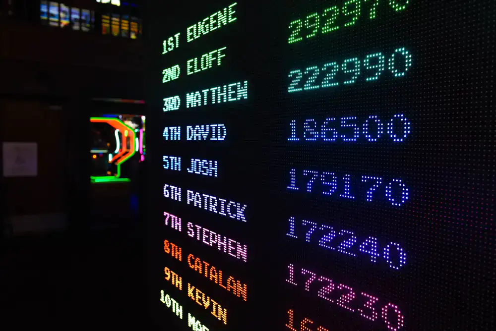 A dramatic wide shot of a trophy and leaderboard graphic