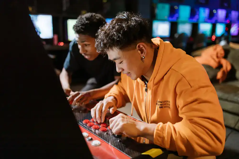 Players fiercely competing in a local fighting game tournament